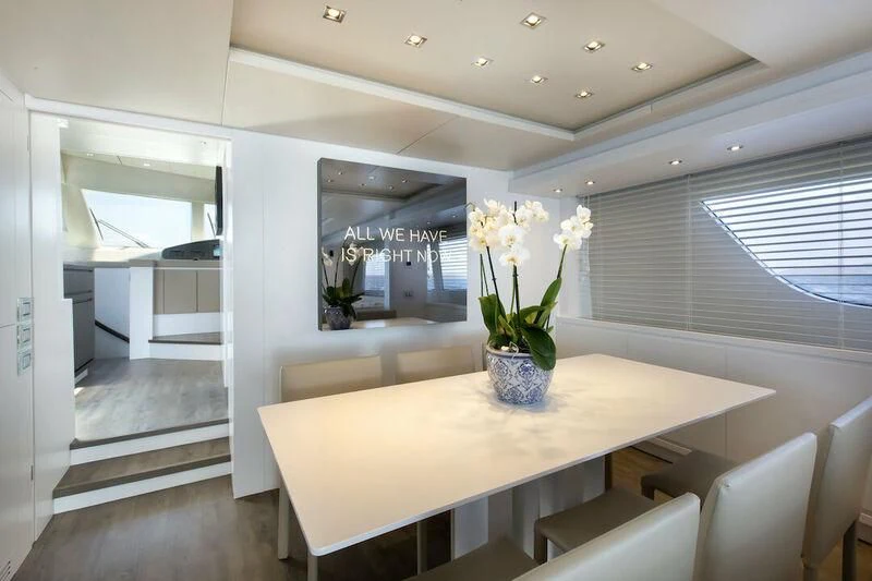 a vase of flowers on a table aboard SANLORENZO SL82-570 Yacht for Sale
