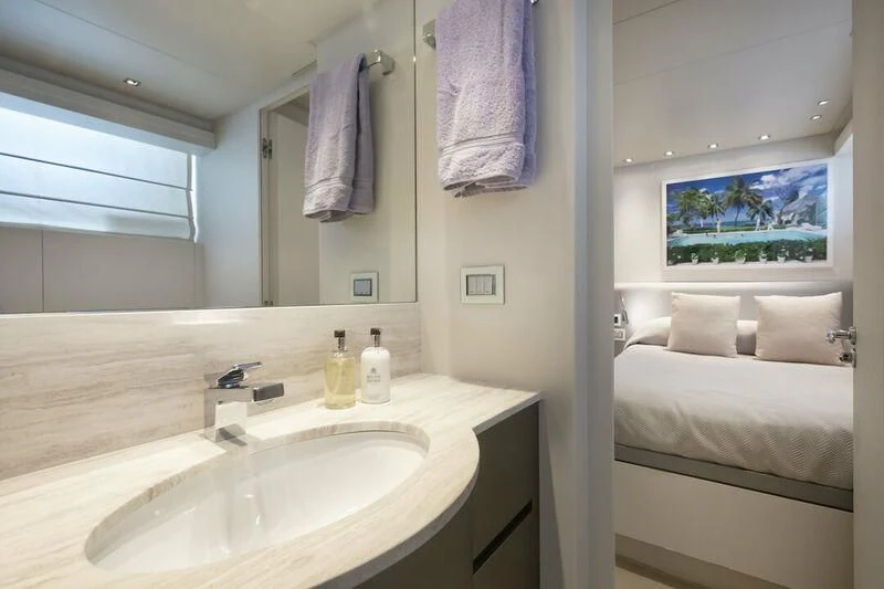 a bathroom with a sink and a bed aboard SANLORENZO SL82-570 Yacht for Sale