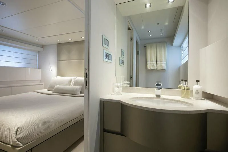 a bathroom with a large mirror aboard SANLORENZO SL82-570 Yacht for Sale