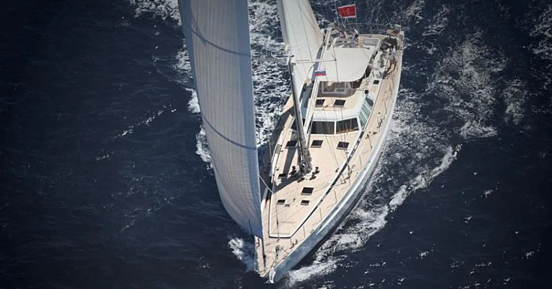 a large white boat in the water aboard SCORPIUS Yacht for Sale