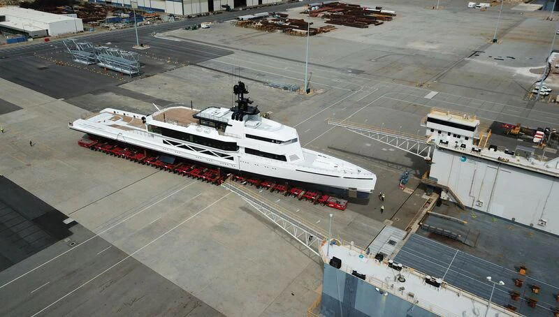 a large white ship docked aboard WANDERLUST Yacht for Charter