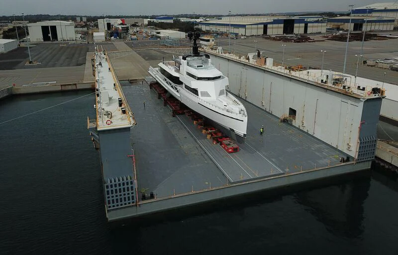 a large ship in a harbor aboard WANDERLUST Yacht for Charter