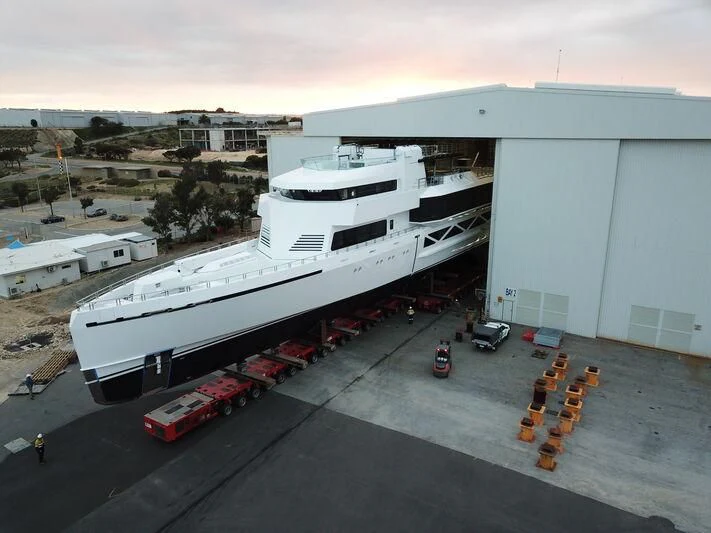a large white ship docked aboard WANDERLUST Yacht for Charter