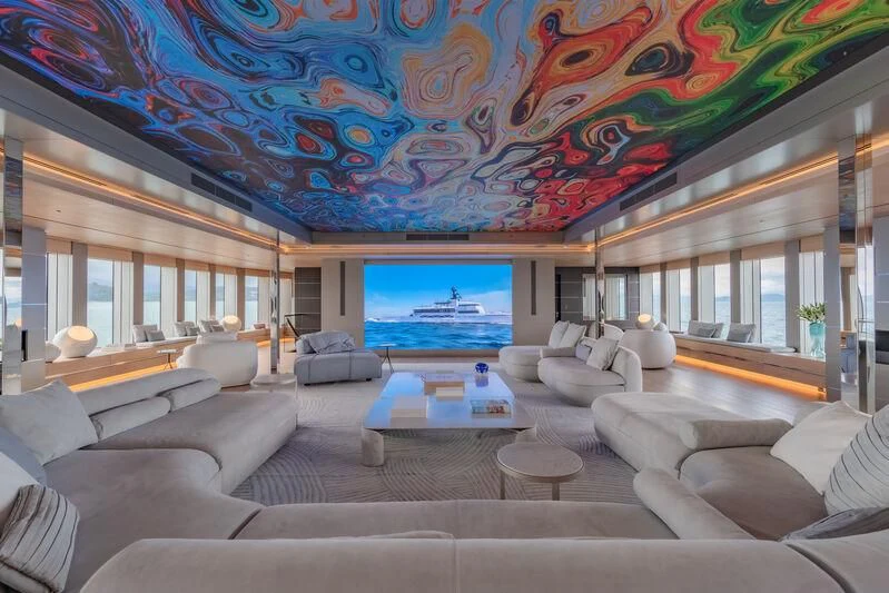 a living room with a large screen aboard WANDERLUST Yacht for Charter