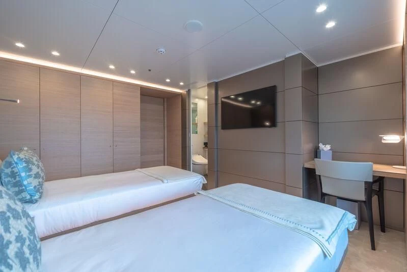 a room with two beds aboard WANDERLUST Yacht for Charter