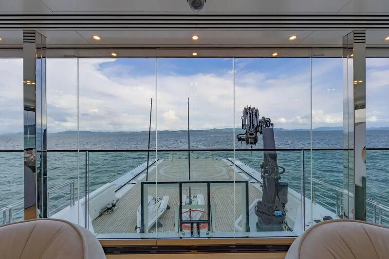 a large glass window with a statue of a person on a boat aboard WANDERLUST Yacht for Charter