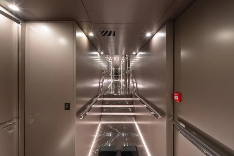a metal staircase in a room aboard WANDERLUST Yacht for Charter