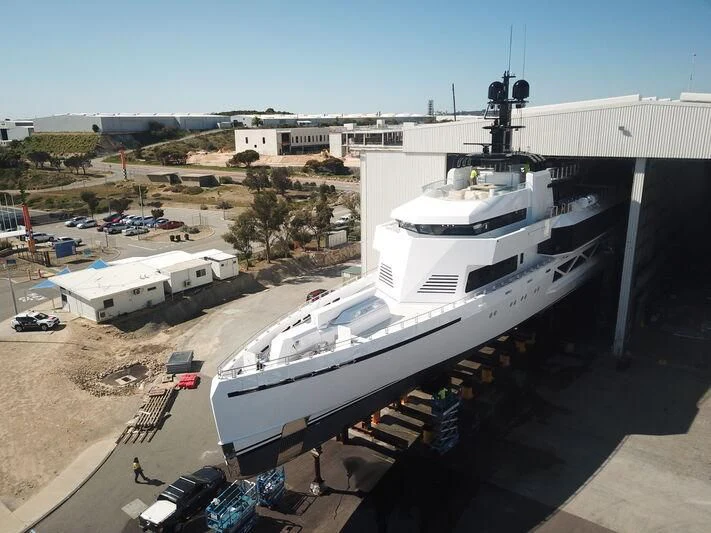 a large white ship docked aboard WANDERLUST Yacht for Charter