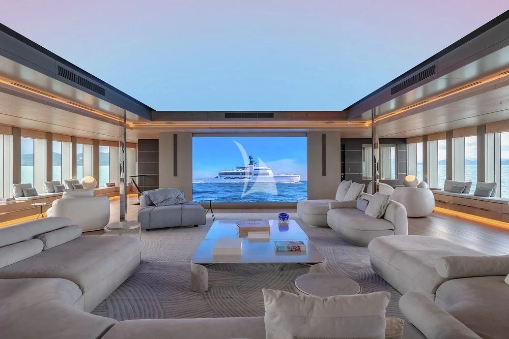 a living room with a large screen aboard WANDERLUST Yacht for Charter