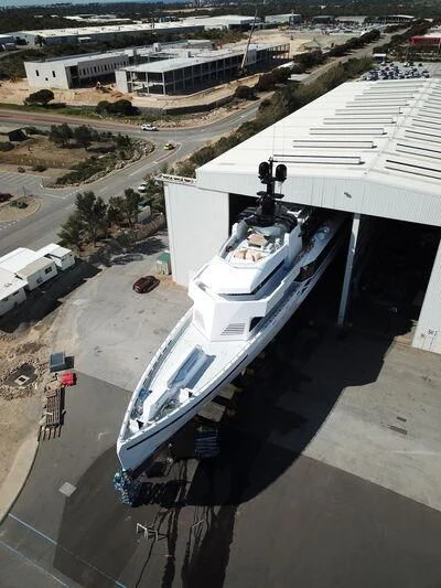 a white boat on a dock aboard WANDERLUST Yacht for Charter