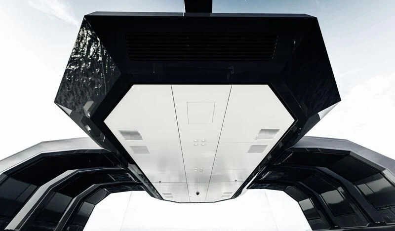 a large clock on a tower aboard WANDERLUST Yacht for Charter