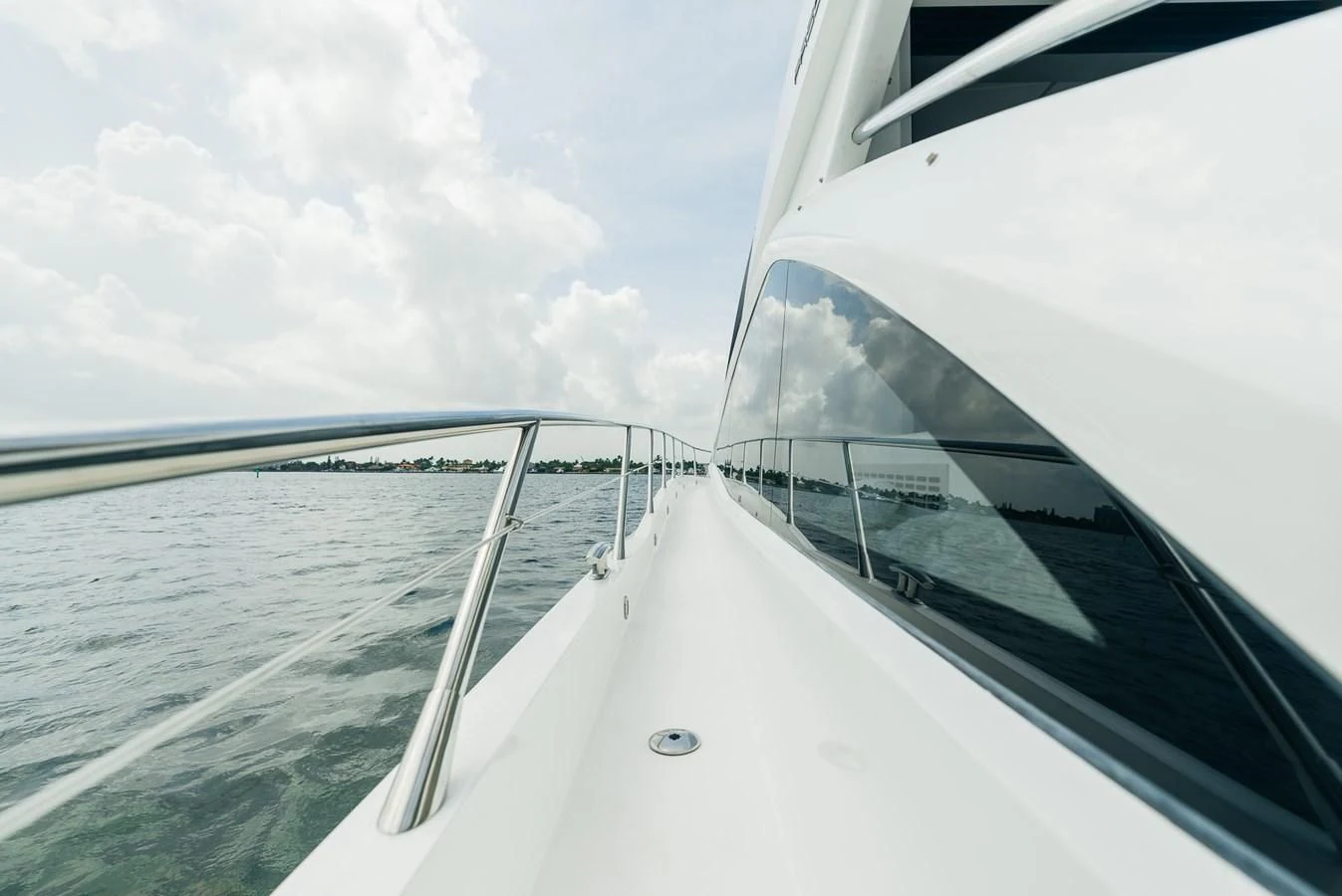 a view of the back of a boat on the water aboard GRAVITAS Yacht for Charter