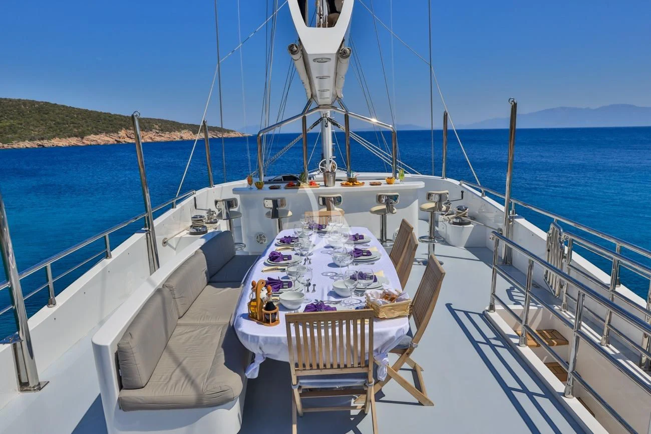 a table on a boat aboard CANARIA Yacht for Sale
