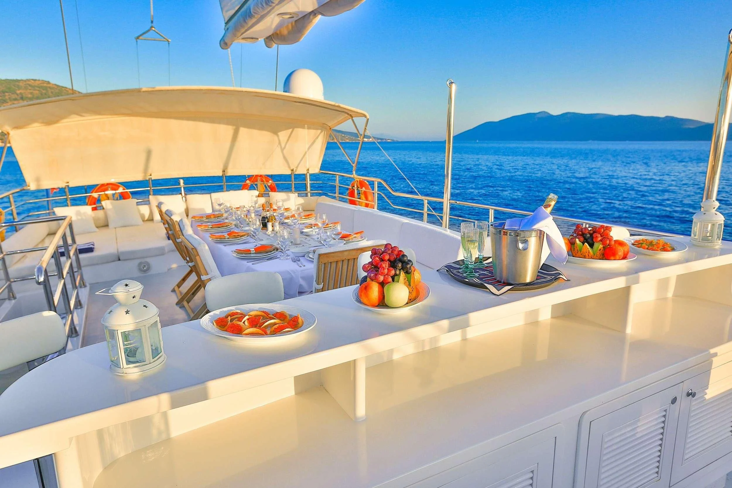 a table with food on it aboard CANARIA Yacht for Sale