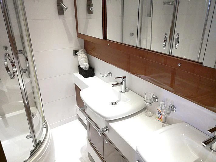 a bathroom with two sinks aboard CANARIA Yacht for Sale