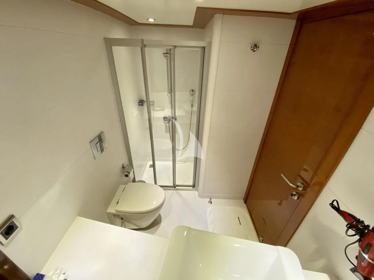 a bathroom with a shower and toilet aboard CANARIA Yacht for Sale