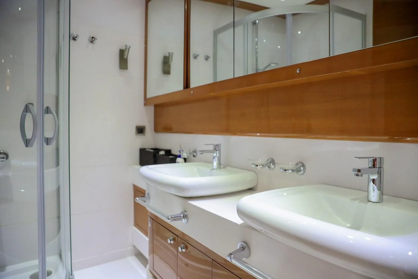 a bathroom with two sinks aboard CANARIA Yacht for Sale