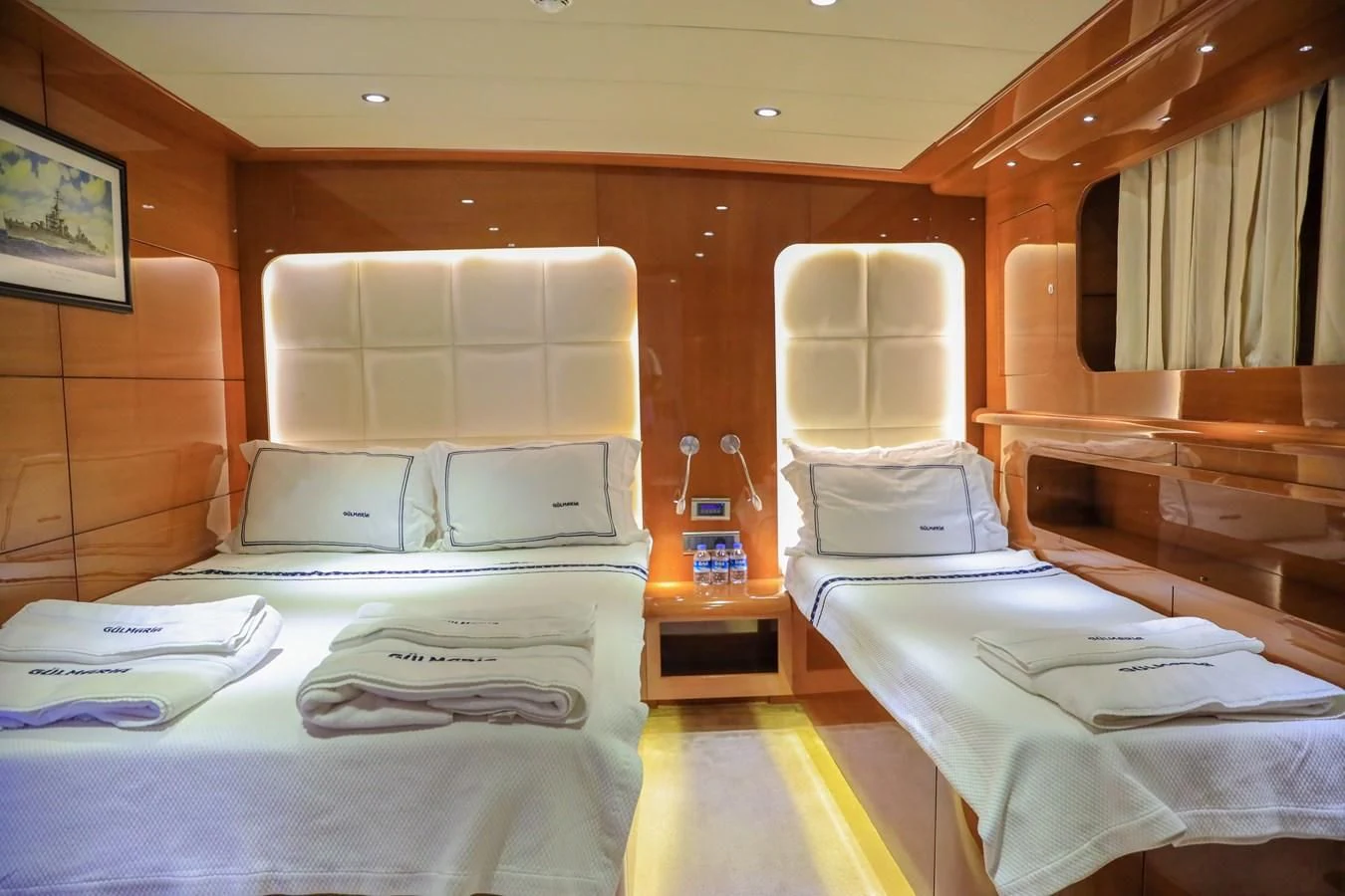 a room with two beds aboard CANARIA Yacht for Sale