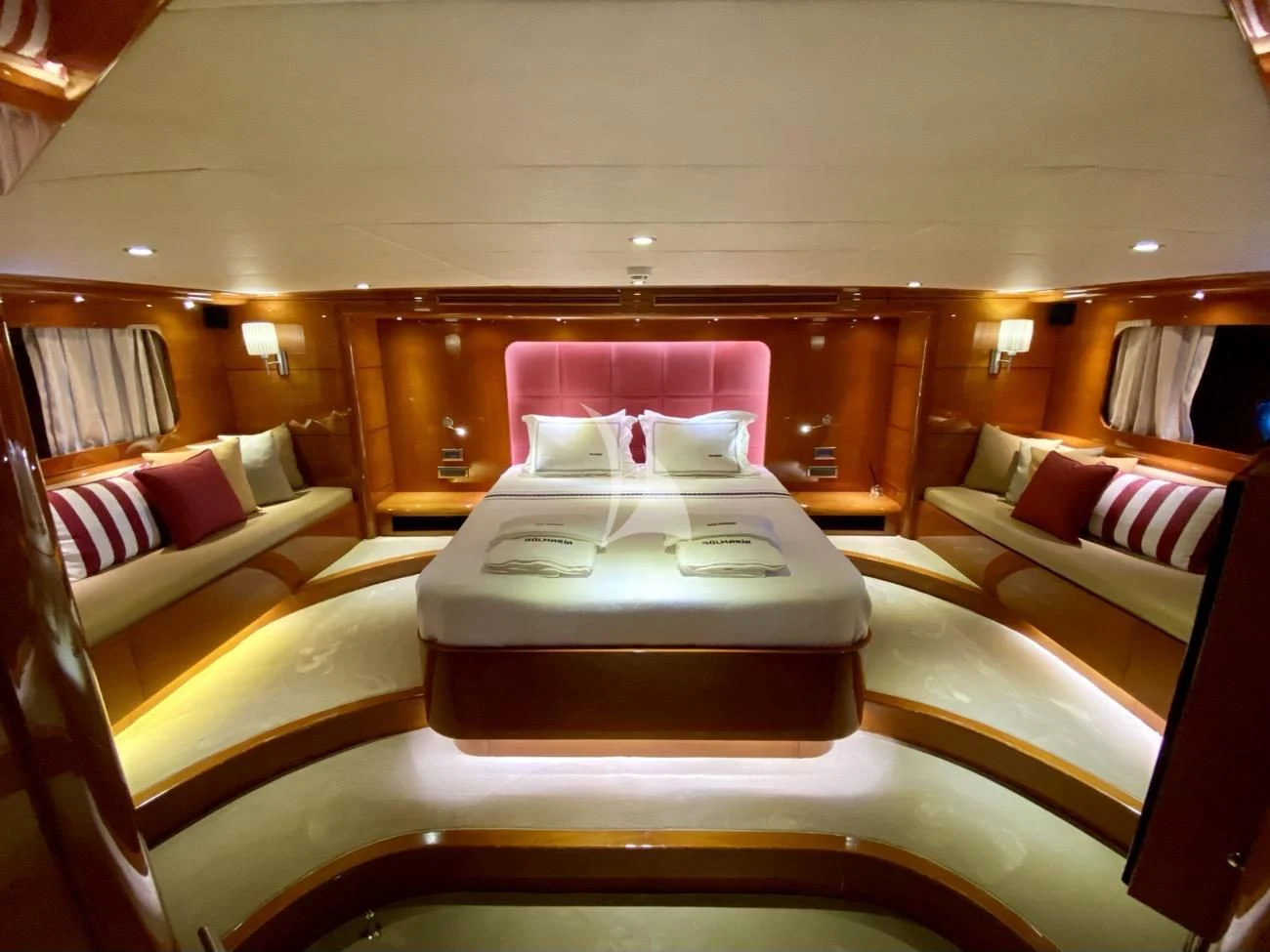 a living room with a couch and a table aboard CANARIA Yacht for Sale