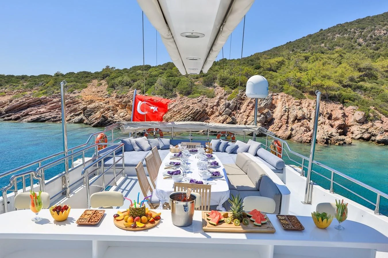 a table with food on it aboard CANARIA Yacht for Sale