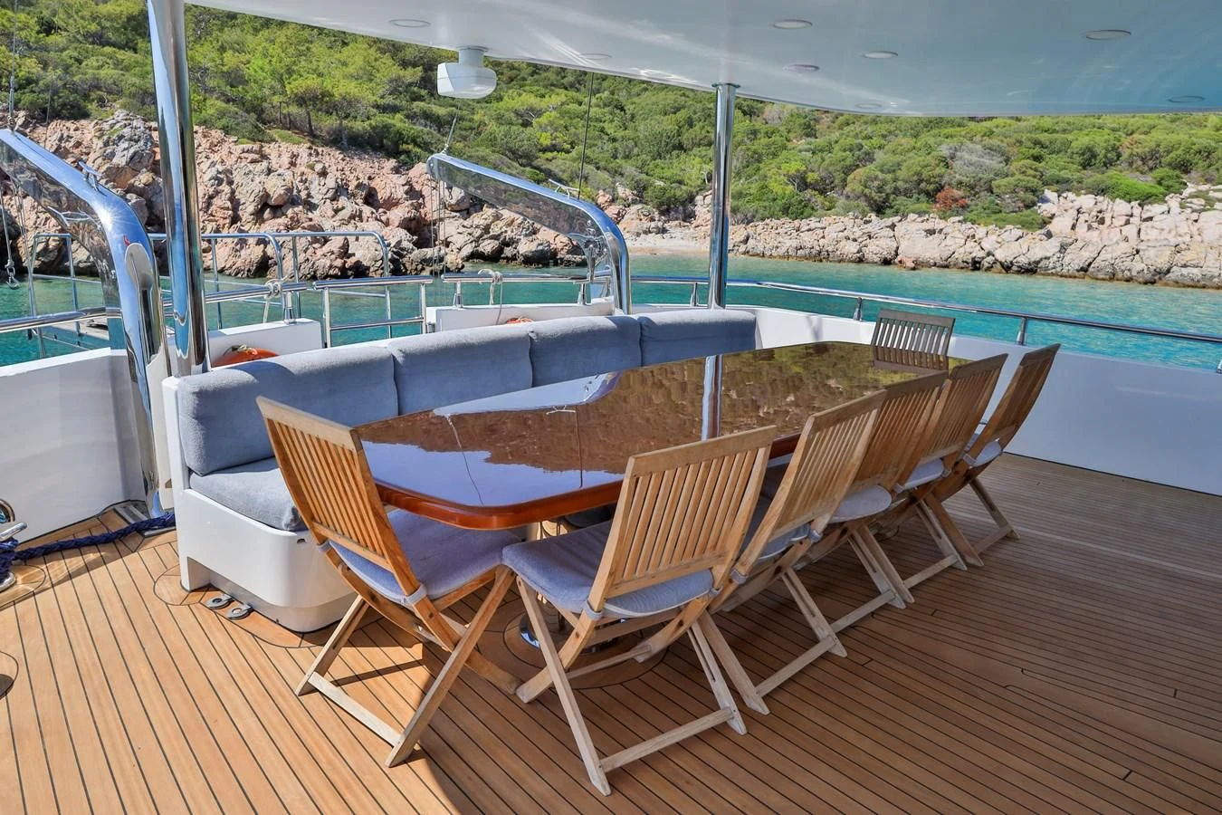 a deck with chairs and a pool aboard CANARIA Yacht for Sale