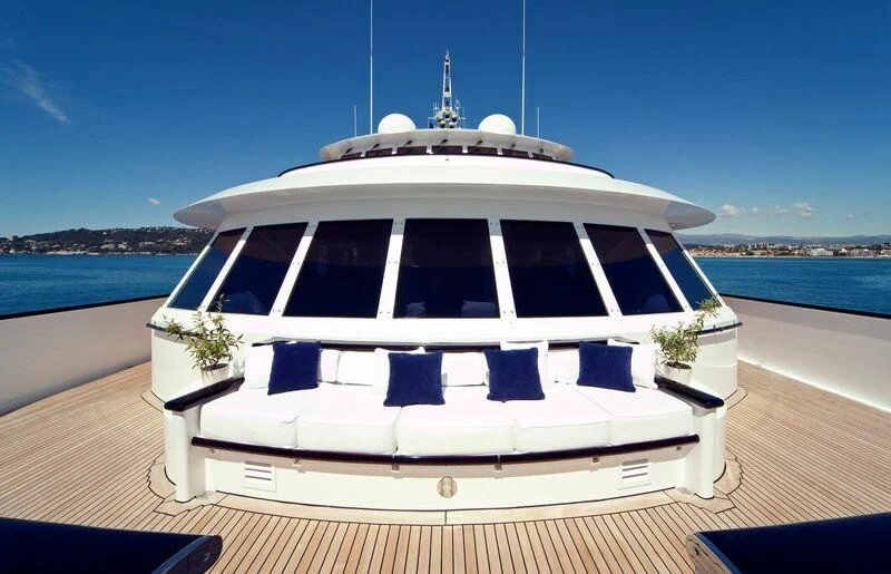 a white boat on a dock aboard VIRGINIAN Yacht for Sale