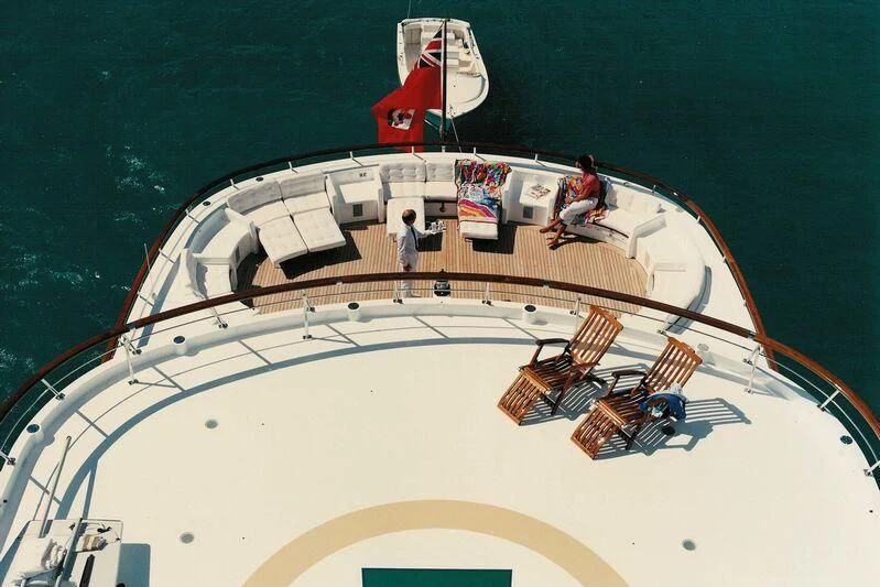 a model of a boat on a body of water aboard VIRGINIAN Yacht for Sale