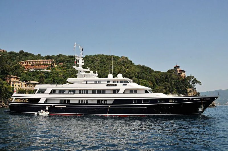 a large boat in the water aboard VIRGINIAN Yacht for Sale