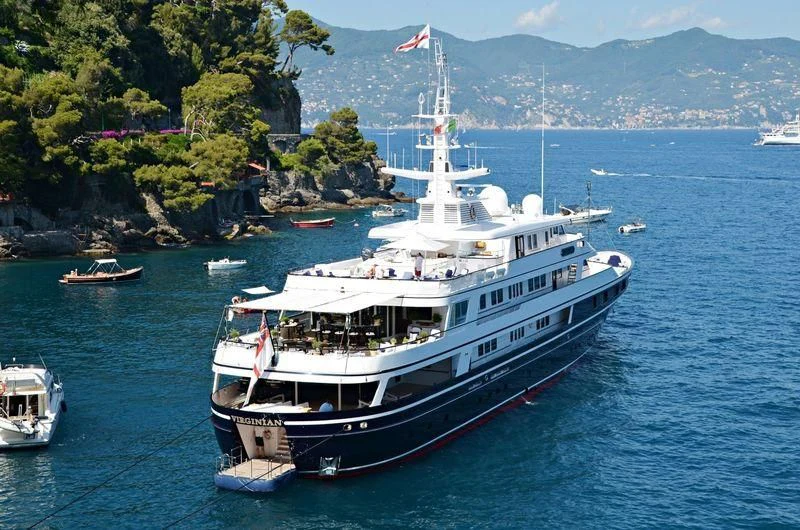 a large boat in the water aboard VIRGINIAN Yacht for Sale
