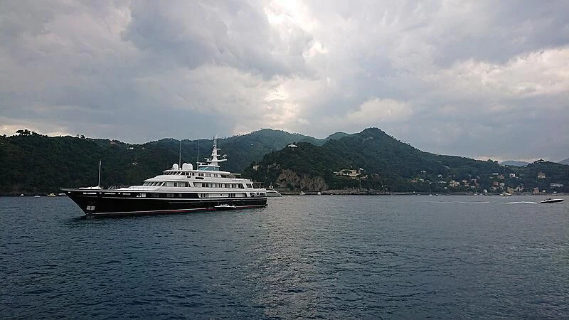 a large boat in the water aboard VIRGINIAN Yacht for Sale