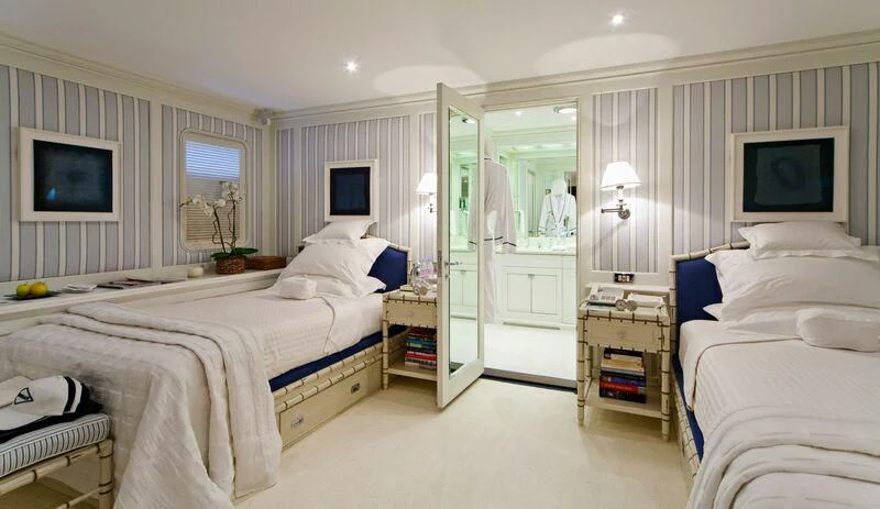 a room with two beds aboard VIRGINIAN Yacht for Sale