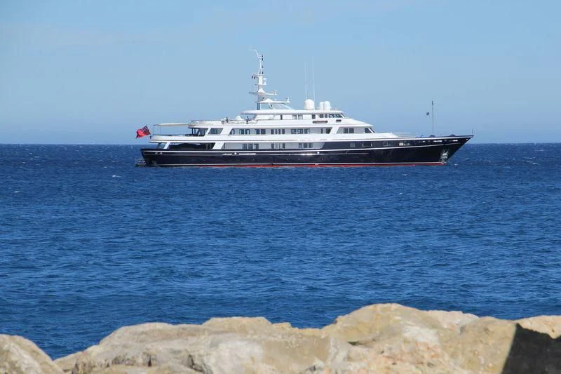 a large boat in the water aboard VIRGINIAN Yacht for Sale