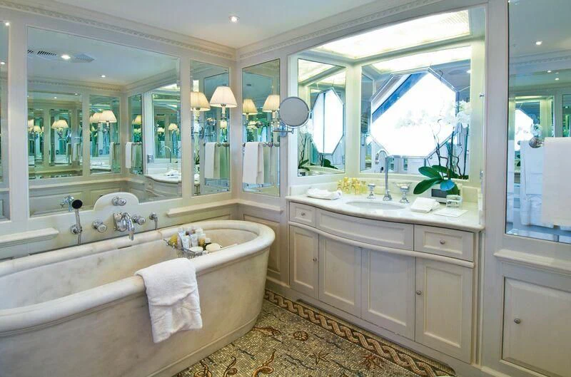 a bathroom with a large bathtub aboard VIRGINIAN Yacht for Sale