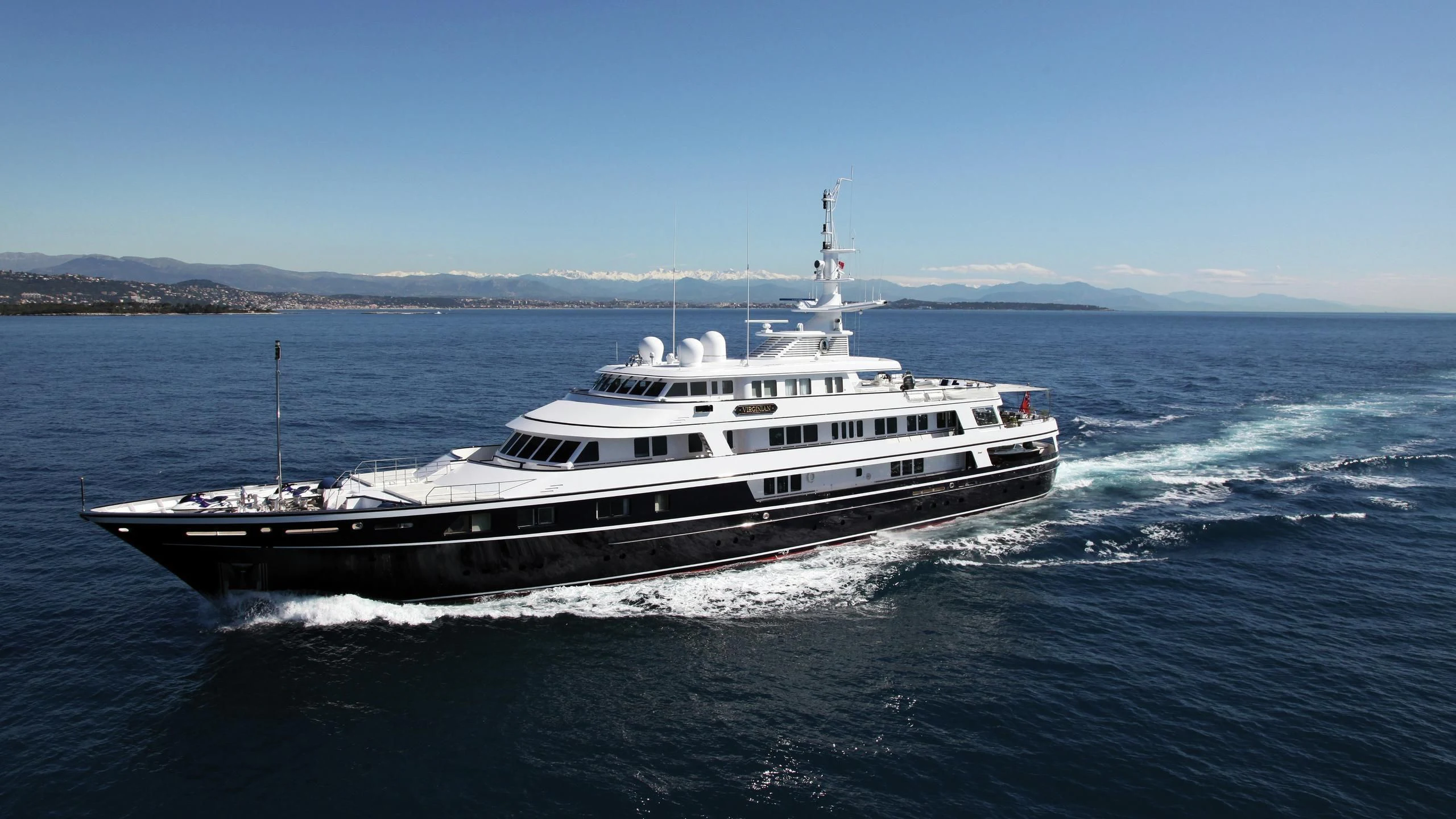 a large white boat in the water aboard VIRGINIAN Yacht for Sale