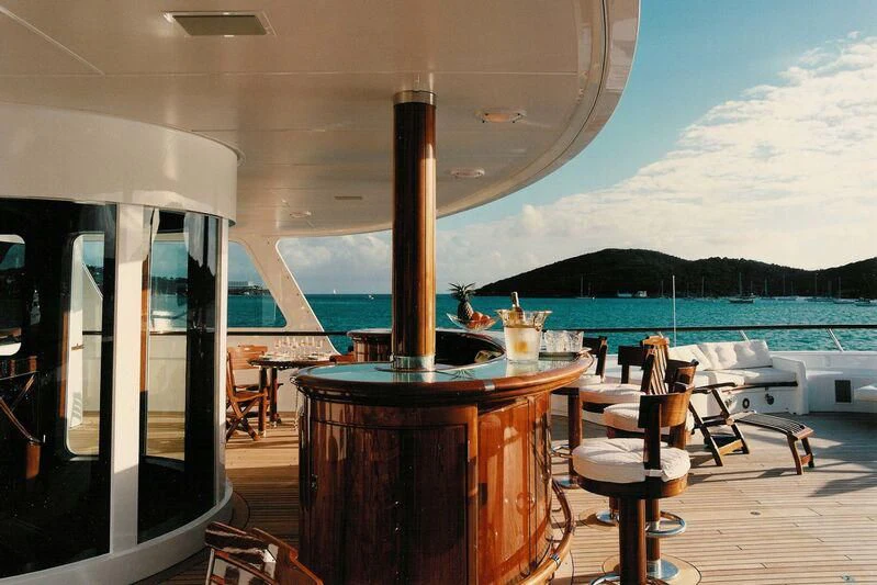 a table on a deck aboard VIRGINIAN Yacht for Sale