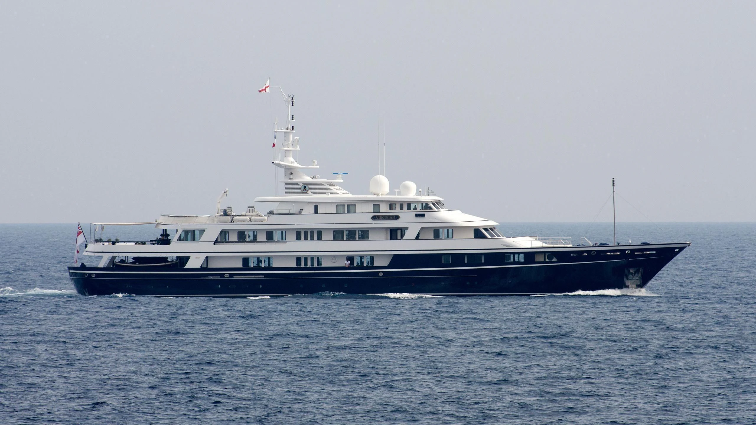 a large white boat aboard VIRGINIAN Yacht for Sale