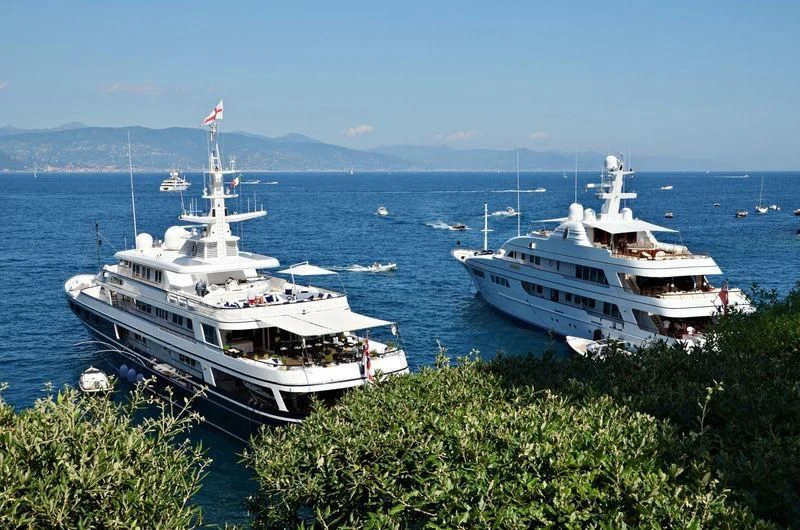 a couple of boats in the water aboard VIRGINIAN Yacht for Sale