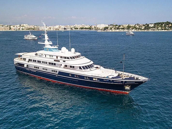 a large boat in the water aboard VIRGINIAN Yacht for Sale