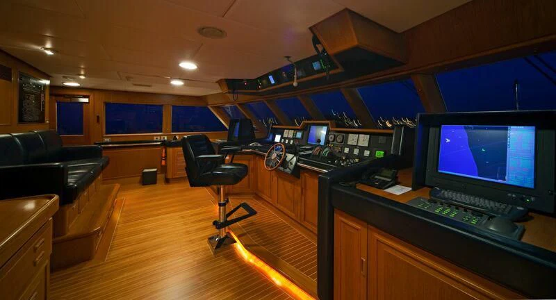 a room with a computer and a tv aboard VIRGINIAN Yacht for Sale