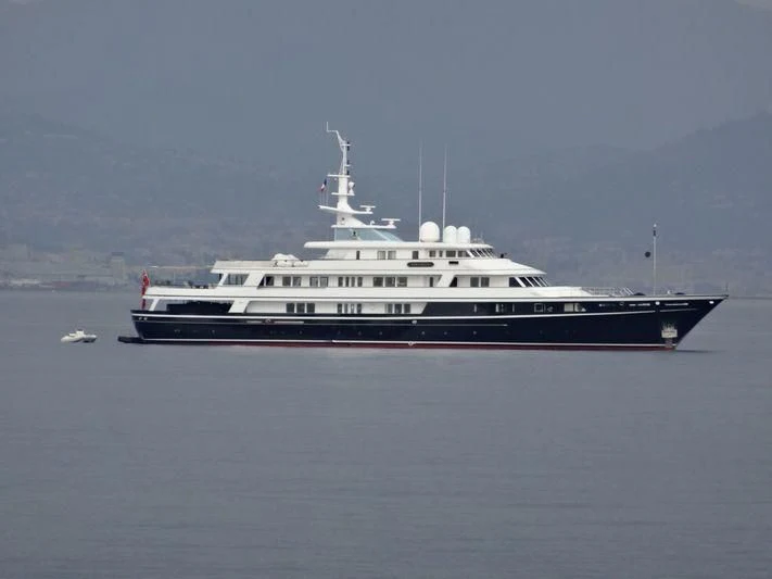 a large boat in the water aboard VIRGINIAN Yacht for Sale