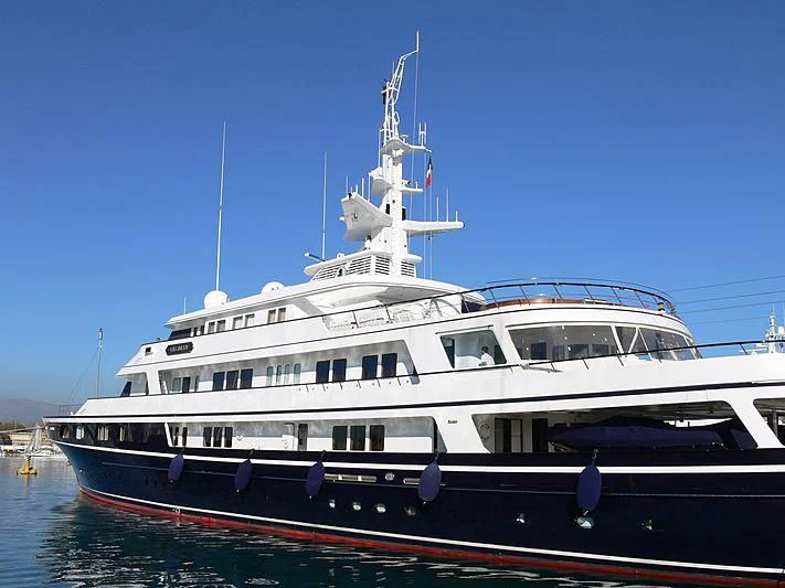 a large boat in the water aboard VIRGINIAN Yacht for Sale