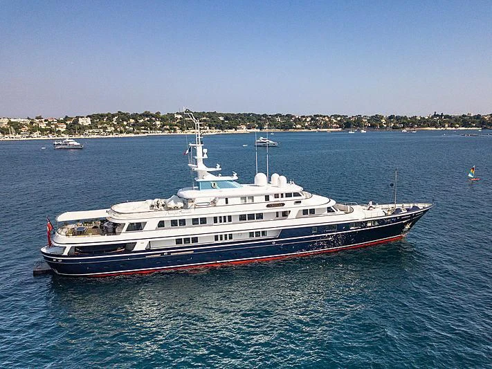 a large boat in the water aboard VIRGINIAN Yacht for Sale