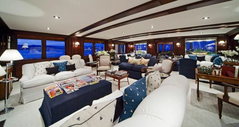 a living room with a large window aboard VIRGINIAN Yacht for Sale