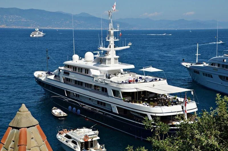 a large white boat in the water aboard VIRGINIAN Yacht for Sale
