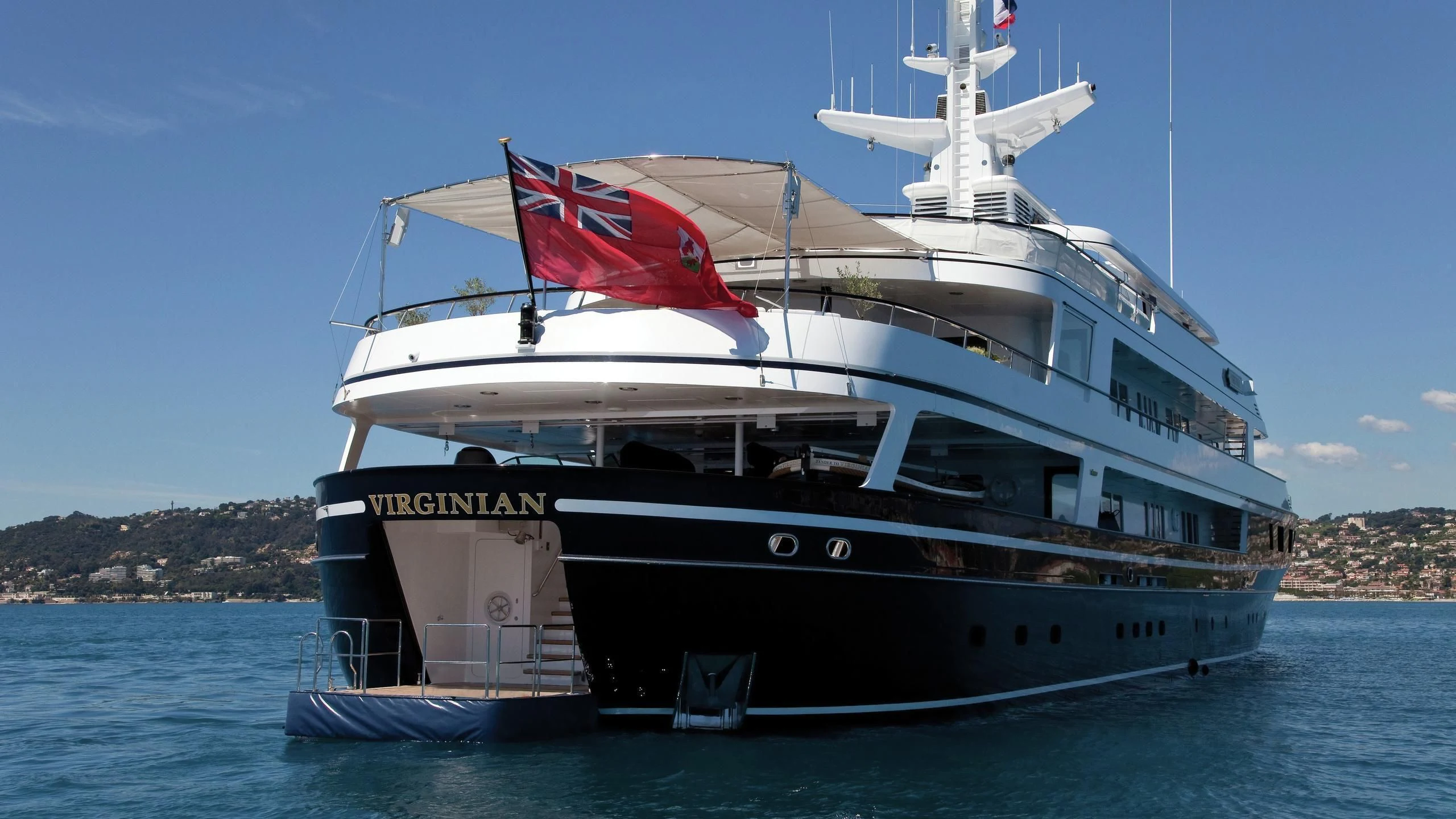 a large boat in the water aboard VIRGINIAN Yacht for Sale