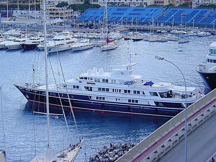 a large ship in the water aboard VIRGINIAN Yacht for Sale