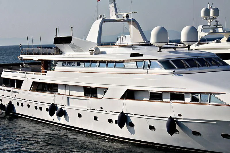 a white yacht on the water aboard DARNICE III Yacht for Sale