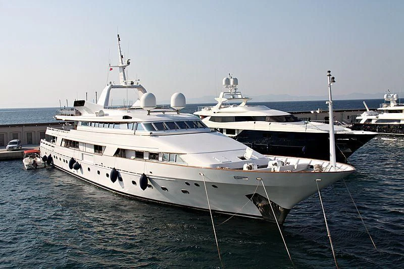 a white yacht in the water aboard DARNICE III Yacht for Sale