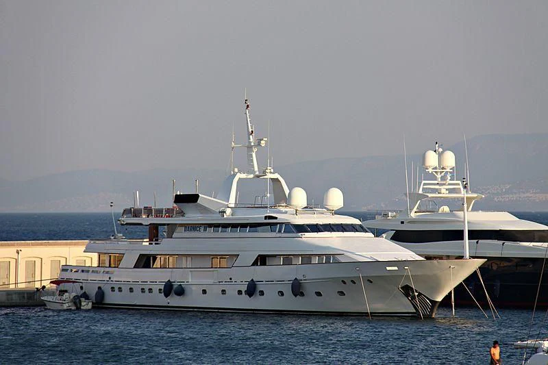 a large white boat in the water aboard DARNICE III Yacht for Sale