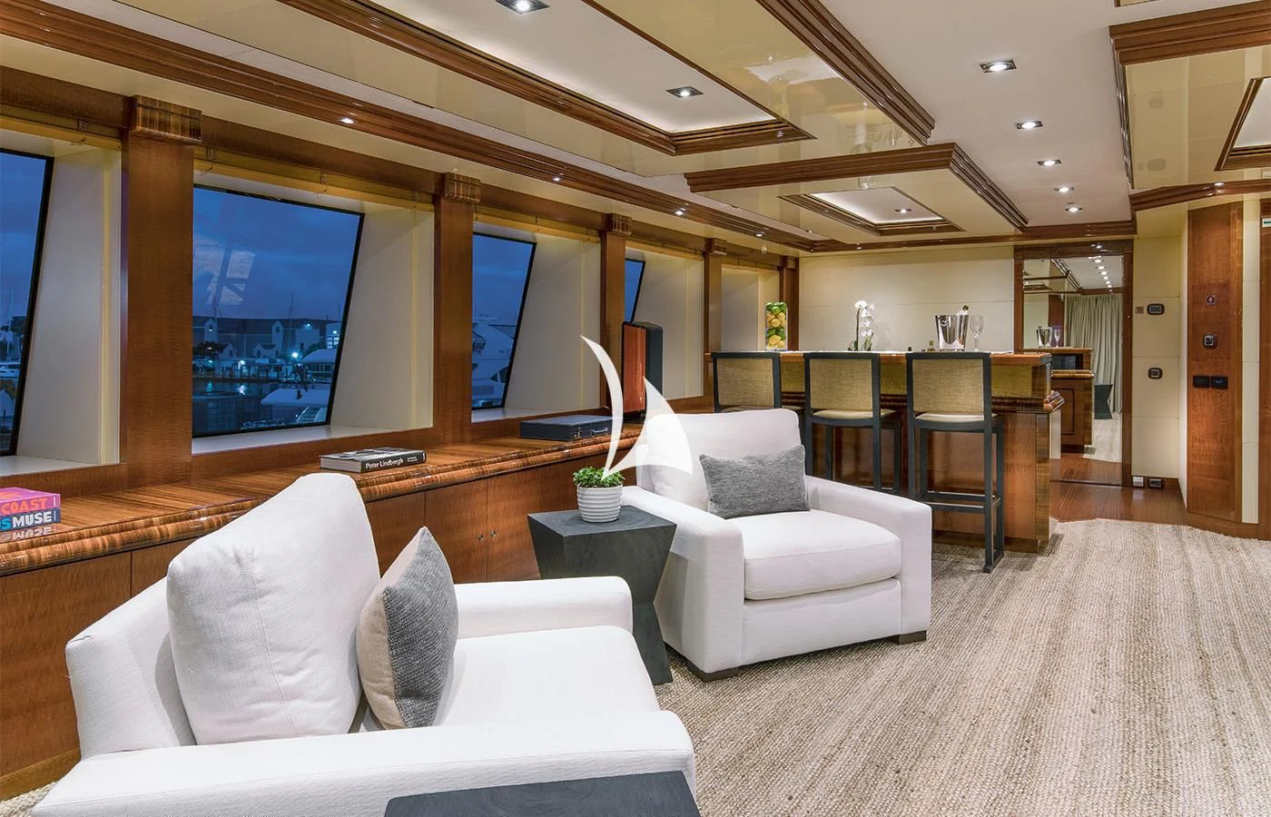 a living room with a large screen aboard ARBEMA Yacht for Sale